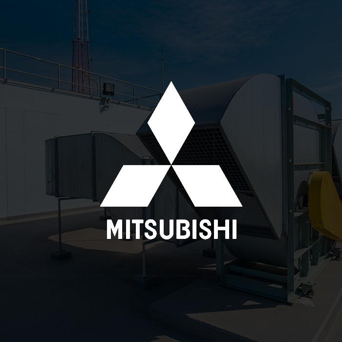 Mitsubishi logo with a machine in background